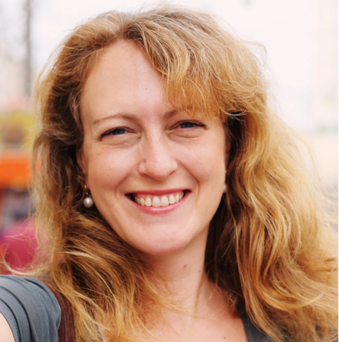 picture of shirley davis. old woman smiling and wearing with a white shirt